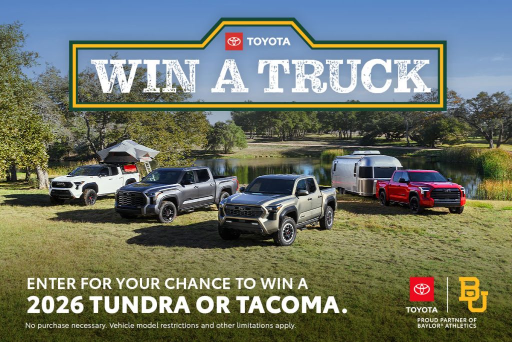 Photo of multiple Toyota trucks including a 2026 Toyota Tundra and 2026 Toyota Tacoma parked by a lake during the Toyota Win A Truck Giveaway Sweepstakes. Promotional prize image showing a chance to win a new Toyota truck, featuring Tundra and Tacoma models in an outdoor camping-style setting for the Win A Truck sweepstakes giveaway.