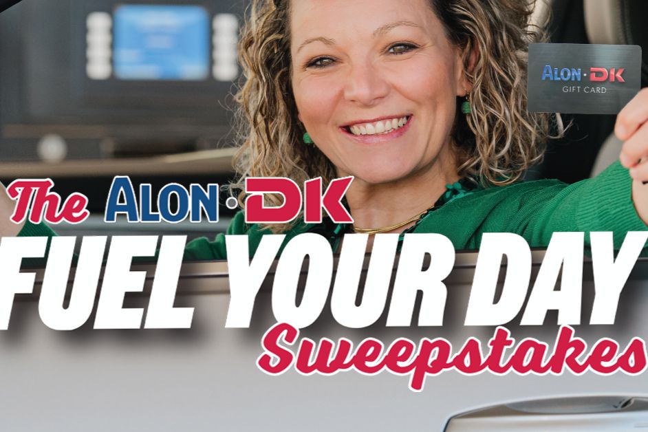 Smiling woman at a gas pump holding an ALON DK fuel gift card next to bold text reading The ALON DK Fuel Your Day Sweepstakes. Promotional sweepstakes image featuring a DK and ALON gas gift card giveaway, with a close-up of the gift card and a friendly customer at the pump. DKFuel Fuel Your Day Sweepstakes banner highlighting the chance to win ALON DK fuel gift cards and a gas gift card sweepstakes promotion.