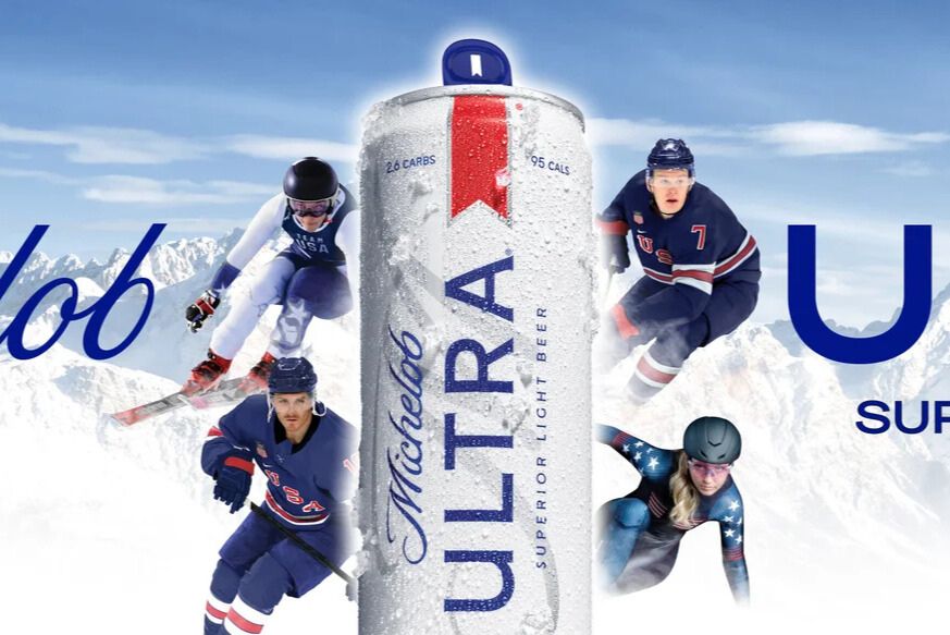 Promo image with a frosty Michelob ULTRA can centered in snowy mountains, surrounded by winter athletes in Team USA-style gear; Superior Access Winter Olympics sweepstakes image promoting a Michelob ULTRA giveaway for Winter Olympics trips, ski prizes, and Olympic-themed rewards.