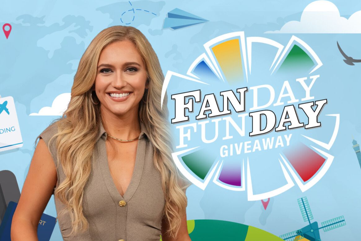 A Wheel of Fortune Fan Day Fun Day Giveaway promo image showing a smiling blonde woman beside a colorful Wheel of Fortune-style prize wheel and “Fan Day Fun Day Giveaway” text, promoting the Wheel of Fortune sweepstakes where viewers can win prizes like trips, gift cards, and merchandise by entering the featured word of the day.