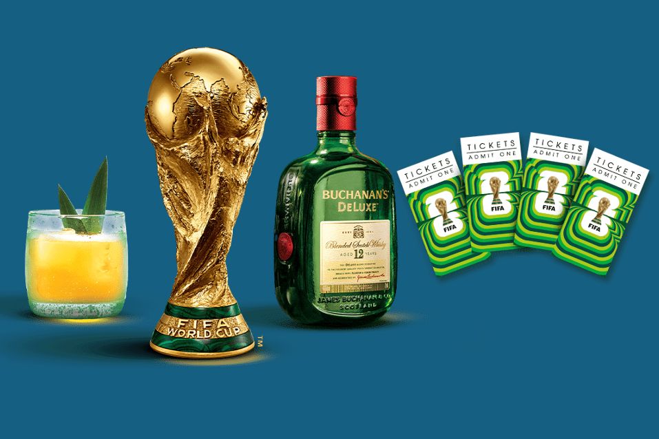 A FIFA World Cup trophy displayed alongside Buchanan’s Deluxe Scotch Whisky and illustrated match tickets, representing a chance to win FIFA World Cup 2026 tickets and a $6,500 gift card in the Buchanan’s dance contest, showcasing the grand prize experience.