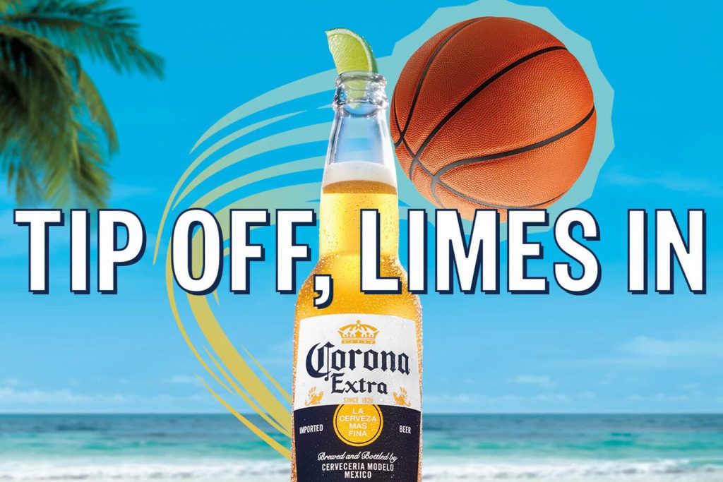 Corona Extra beer bottle with a lime wedge set against a bright beach and ocean backdrop, paired with a basketball graphic and “Tip Off, Limes In” text, representing the Corona NBA Tip Off Sweepstakes featuring cash prizes and a Corona Sand Dunk basketball cooler prize.