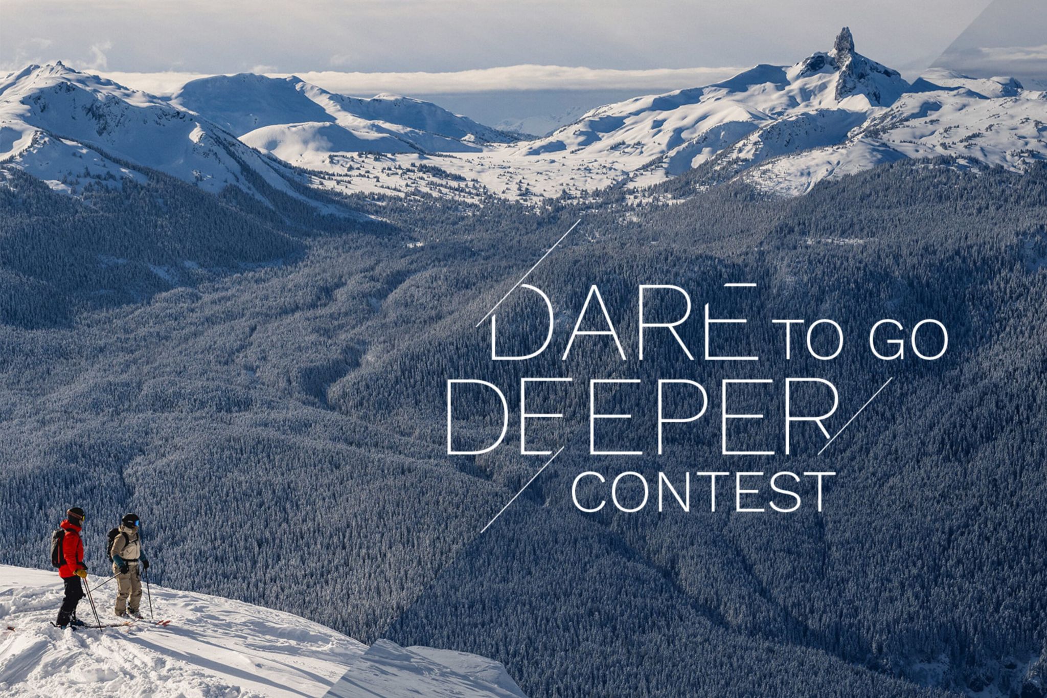 Wide snowy mountain panorama in Whistler with two skiers on a ridge and large “Dare to Go Deeper Contest” text over the winter landscape. Scenic Whistler ski trip imagery showing deep winter terrain, alpine peaks, and backcountry-style views that match a Whistler winter contest getaway prize.