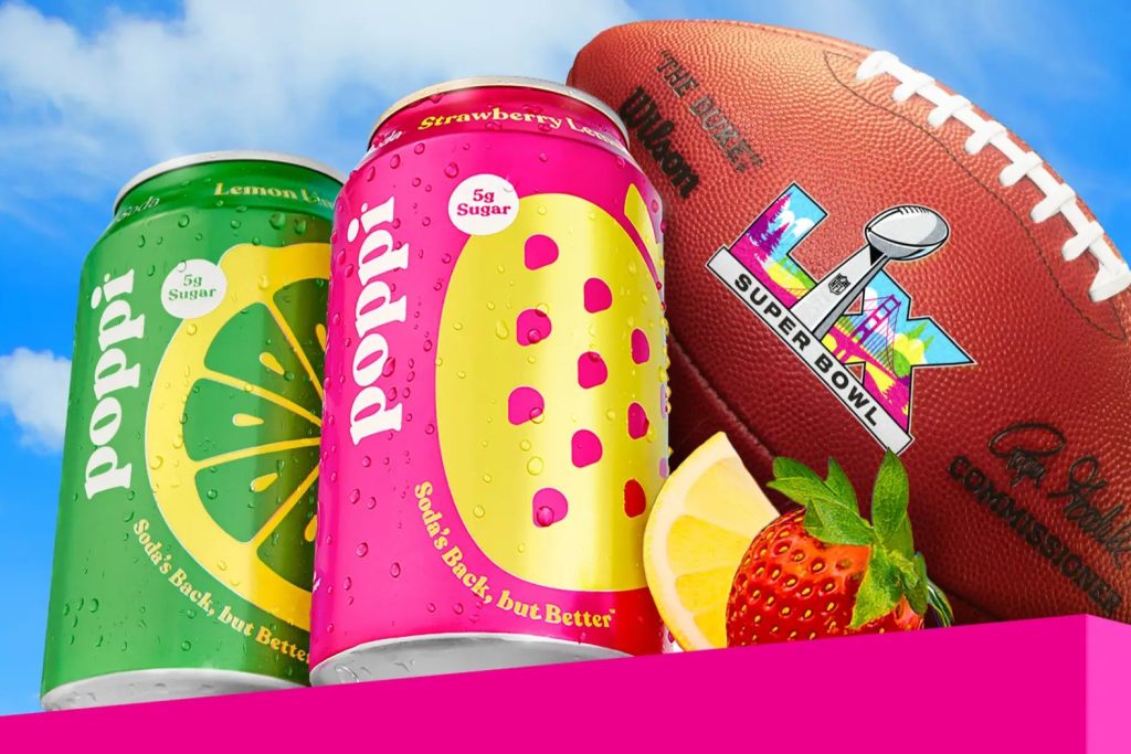 Two poppi soda cans in lemon lime and strawberry lemon flavors next to a football with the Super Bowl LX logo, promoting the poppi Super Bowl LX sweepstakes. Bright close-up of poppi cans with fruit slices and an NFL football, showing the grand prize theme for the poppi big game giveaway and Super Bowl trip contest. Colorful poppi drink cans and Super Bowl LX football imagery representing a poppi sweepstakes to win a Super Bowl LX trip package and weekly game day merch prizes.