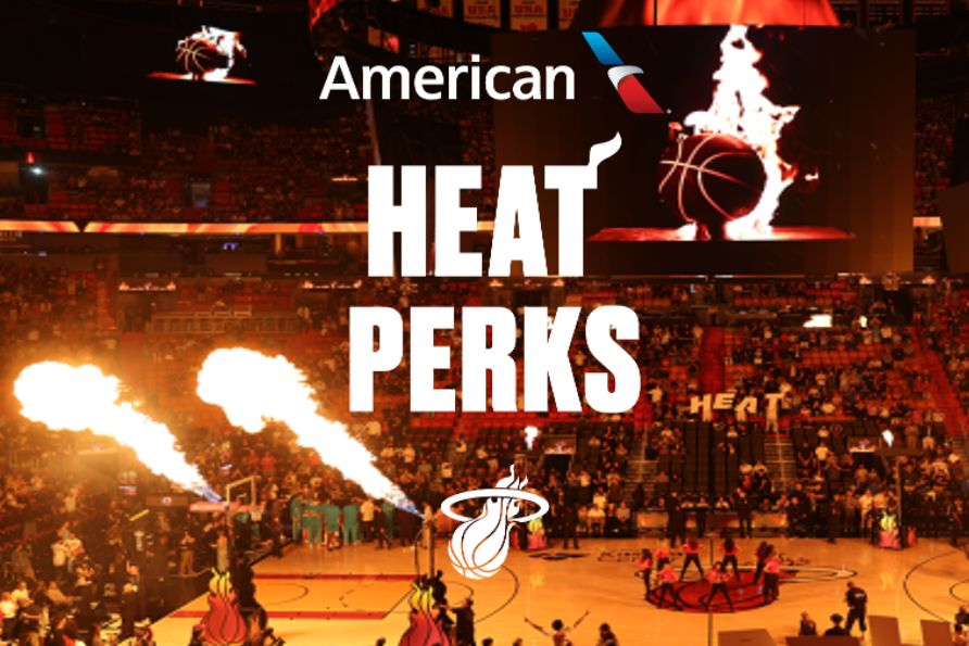 American Airlines Heat Perks graphic showing a packed Miami Heat arena with fire flames shooting above the court and bold HEAT PERKS text for a Miami Heat flyaway Sweepstakes. The image highlights the American Airlines Heat Perks promotion and the Miami Heat flyaway Sweepstakes vibe with a live-game arena scene. A high-energy American Airlines and Miami Heat themed Sweepstakes image featuring the Heat court, crowd, and flames to represent a basketball event trip-style prize.