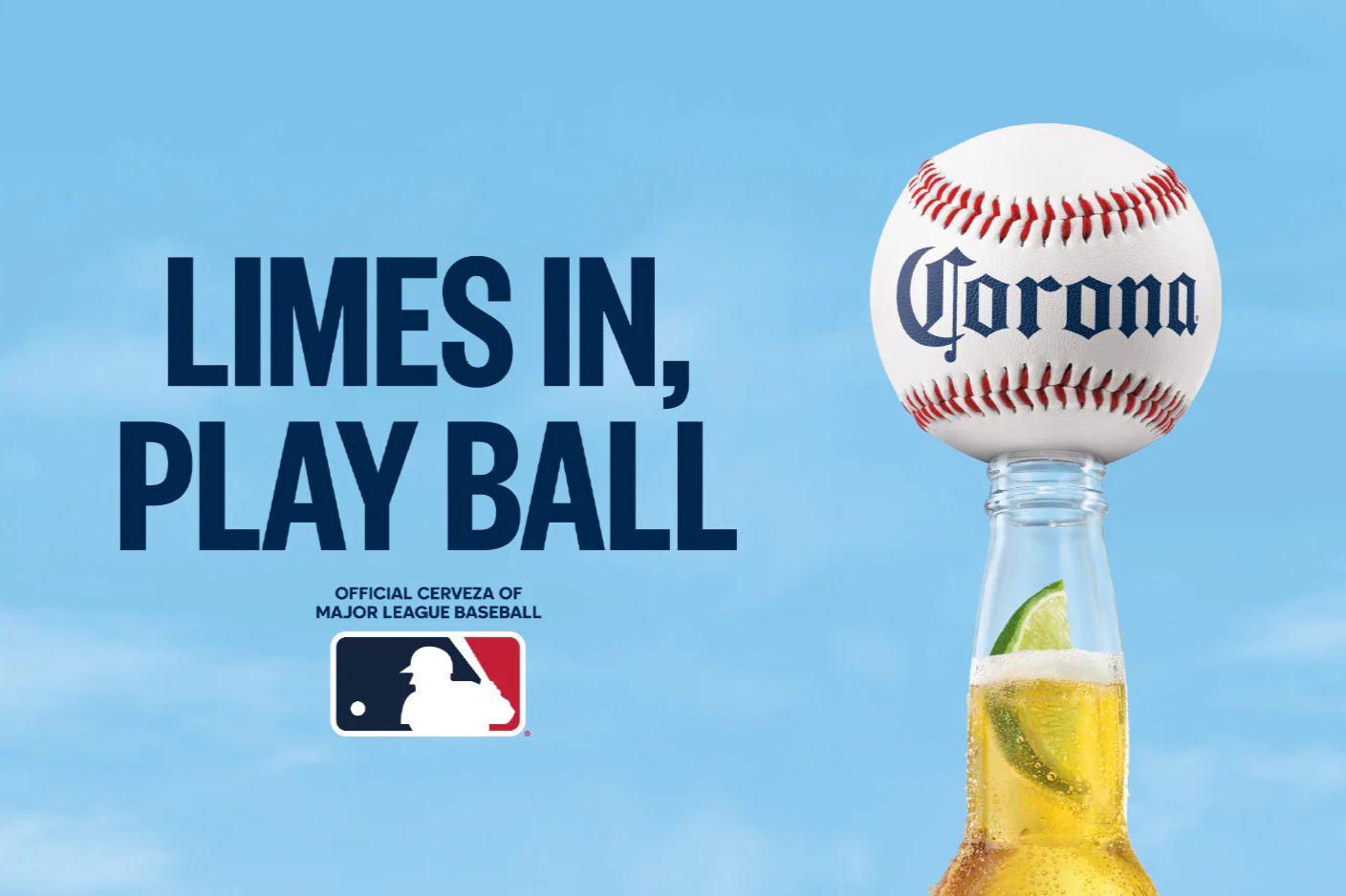 A frosty beer bottle topped with a baseball sits against a blue sky, featuring slices of lime inside the bottle, conveying a vibrant, summery baseball theme, featured in the Corona MLB 2026 Sweepstakes