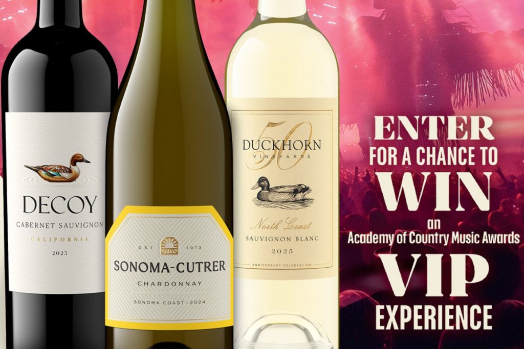 Three wine bottles are displayed: Decoy Cabernet Sauvignon, Sonoma-Cutrer Chardonnay, and Duckhorn Sauvignon Blanc, set against a vibrant background with concert lights and crowd, featured in the Duckhorn ACM Awards Sweepstakes