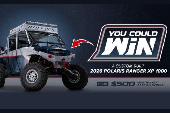 A custom-built 2026 Polaris Ranger XP 1000 is showcased prominently, highlighting its rugged design and featuring a spotlight and off-road tires on a dark textured background, featured in the SuperATV UTV Sweepstakes