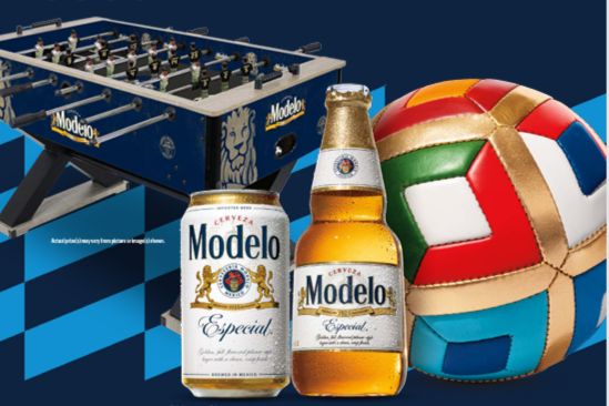 A vibrant foosball table sits prominently with two cans and a bottle of beer nearby, while a colorful soccer ball rests beside them, creating a lively game-themed scene, featured in the Modelo Futbol Sweepstakes