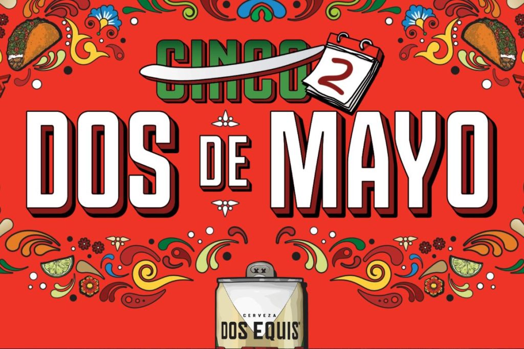 A vibrant festive design features the text "Cinco Dos de Mayo" alongside colorful floral and food motifs, including a taco and lime slices on a bright red background, featured in the Dos Equis Dos De Mayo Sweepstakes