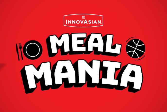 Bold text displays "MEAL MANIA" against a vibrant red background, accompanied by a plate and basketball graphic, creating an energetic and playful vibe, featured in the InnovAsian $25,000 Sweepstakes