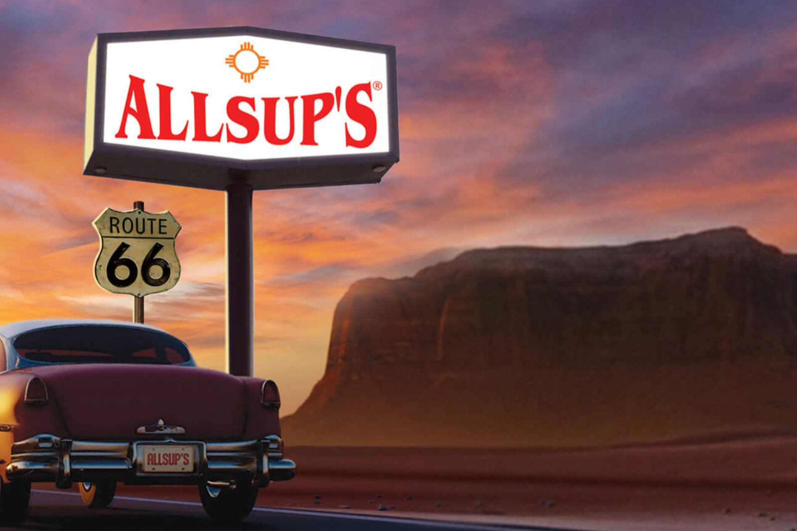 A vintage car is parked at a roadside stop with signs for Route 66 and a gas station against a colorful sunset backdrop, highlighting the natural landscape in the distance, featured in the Yesway Route 66 Fuel Sweepstakes