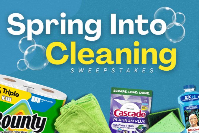 Bright blue background featuring cleaning supplies including Bounty paper towels, Cascade dish detergent, and sponges, with bubbles and text promoting a spring cleaning sweepstakes, featured in the Market Basket $1,000 Gift Card Sweepstakes