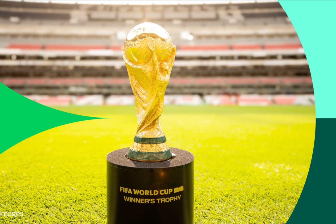 The FIFA World Cup trophy stands on a pedestal in a brightly lit stadium, surrounded by green grass, highlighting its significance in sports history, featured in the Visa FIFA World Cup 2026 Match Sweepstakes
