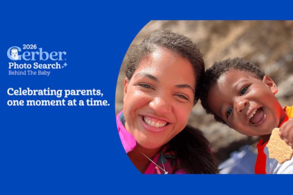 A woman smiles brightly alongside a cheerful child, both enjoying a sunny outdoor moment together, exuding joy and connection, featured in the Gerber Photo Search Sweepstakes