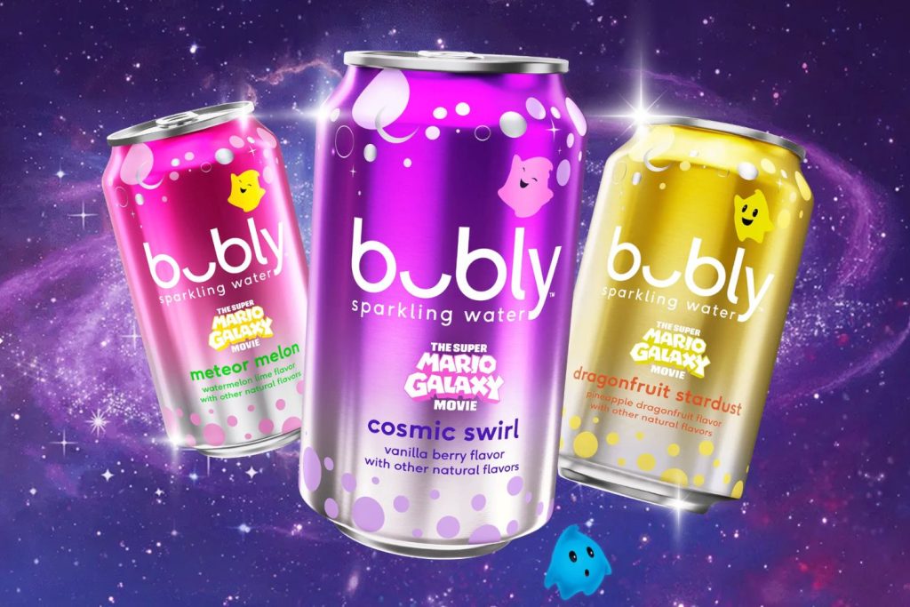 Three colorful cans of bubbly sparkling water float against a cosmic backdrop, featuring flavors like meteor melon, cosmic swirl, and dragonfruit stardust, with playful designs, featured in the bubly Galaxy Getaway Sweepstakes