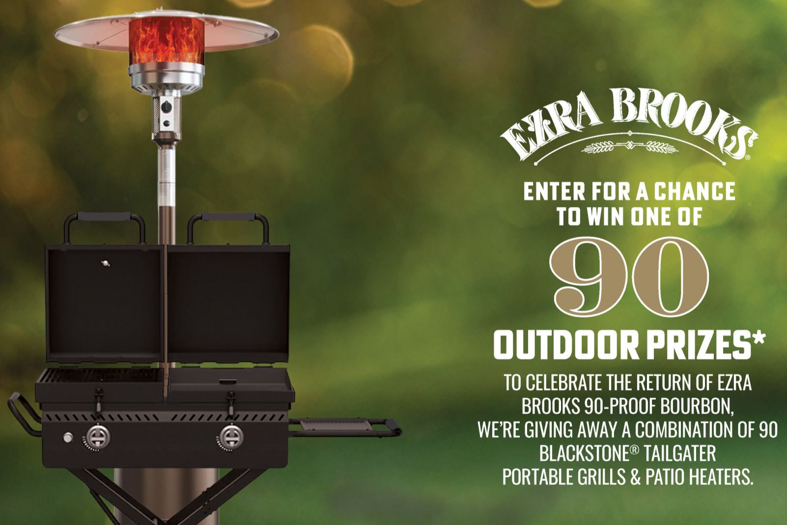 A shiny, silver outdoor patio heater stands beside a Blackstone tailgate grill, set against a blurred green background, creating an inviting atmosphere for outdoor gatherings, featured in the Ezra Brooks Grill & Heater Sweepstakes
