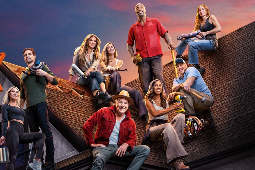 A diverse group of nine individuals poses on a rooftop at sunset, showcasing tools and equipment, with a vibrant sky in the background, reflecting teamwork and creativity, featured in the HGTV 5K Sweepstakes
