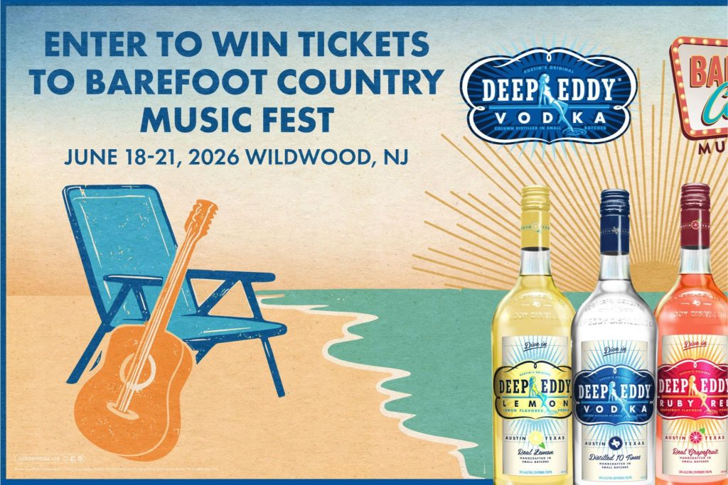 A beach scene features a blue chair beside a sunlit shoreline. An acoustic guitar rests nearby, with three bottles of vodka displayed on the right against a colorful background, featured in the Deep Eddy Vodka Barefoot Festival Sweepstakes