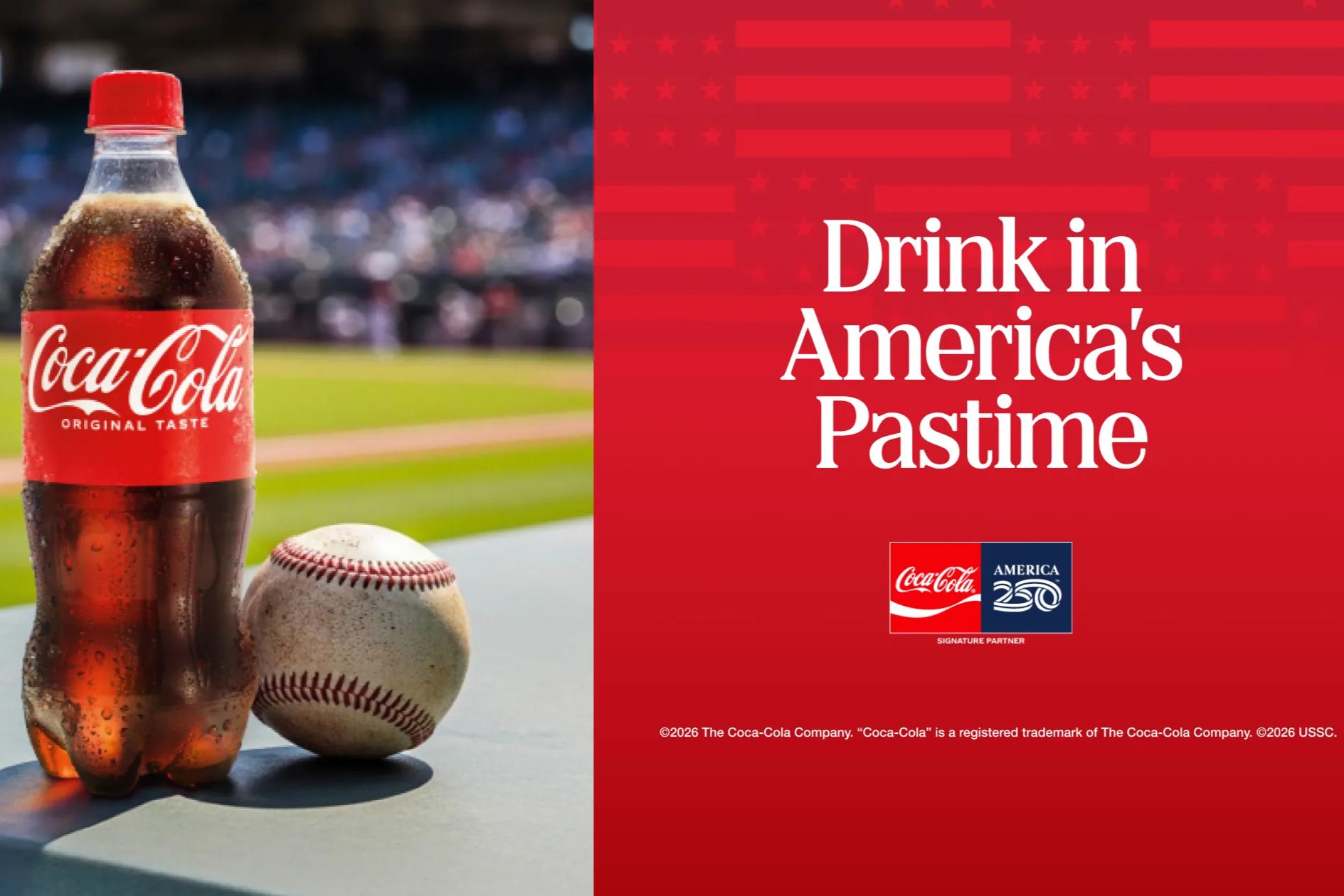 A chilled bottle of soda stands next to a baseball on a table, with a lively baseball field blurred in the background, representing America's favorite pastime, featured in the Coca-Cola America 250 Baseball Sweepstakes