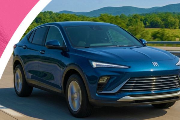 A sleek blue SUV drives along a smooth highway, surrounded by green hills under a clear sky, showcasing its modern design and dynamic presence on the road, featured in the RNR Tire Express 2026 Buick Envista Sweepstakes