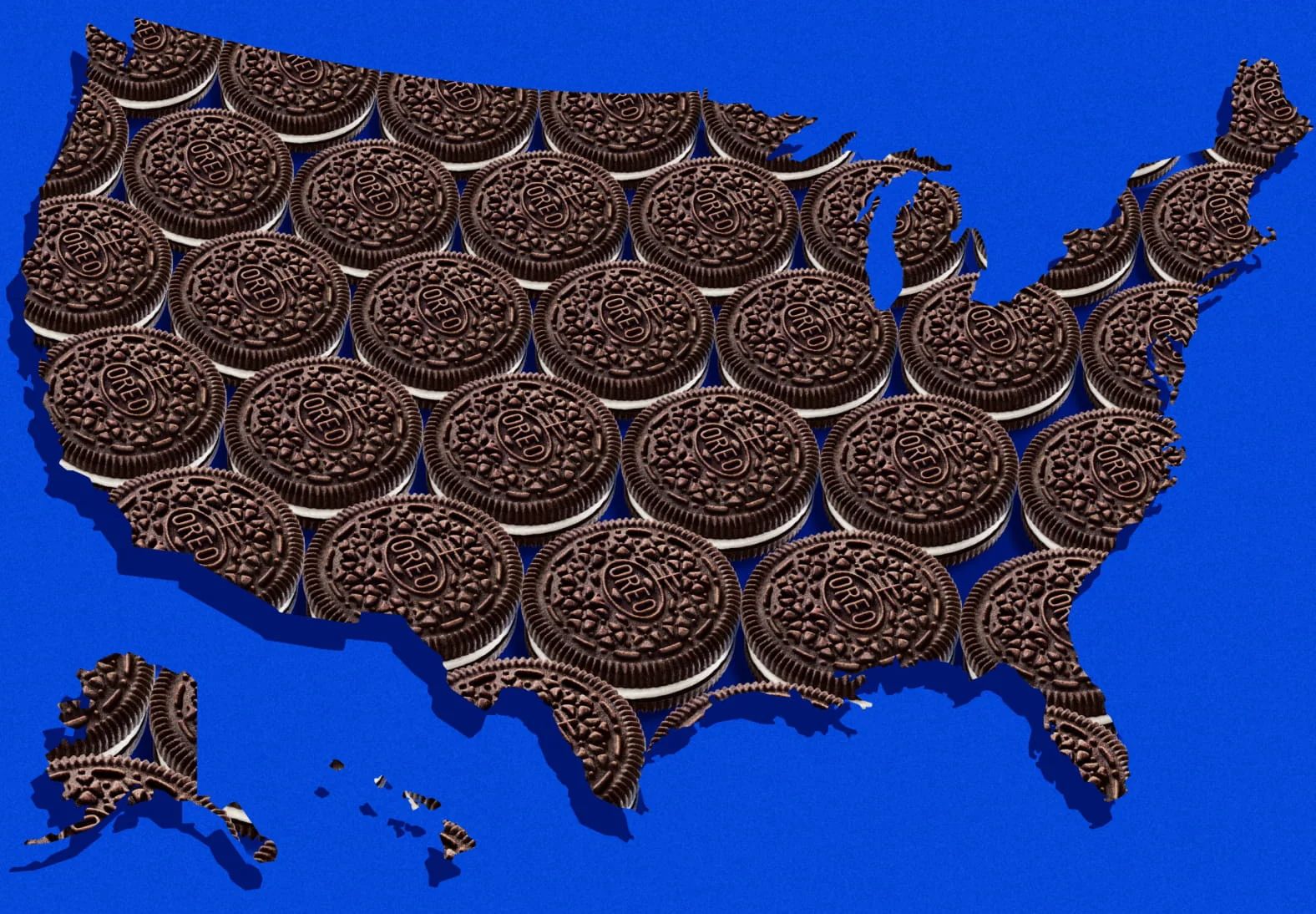 A map of the United States is creatively filled with rows of chocolate cookies, resembling Oreo cookies, over a bright blue background, featured in the Oreo $1,000 Sweepstakes