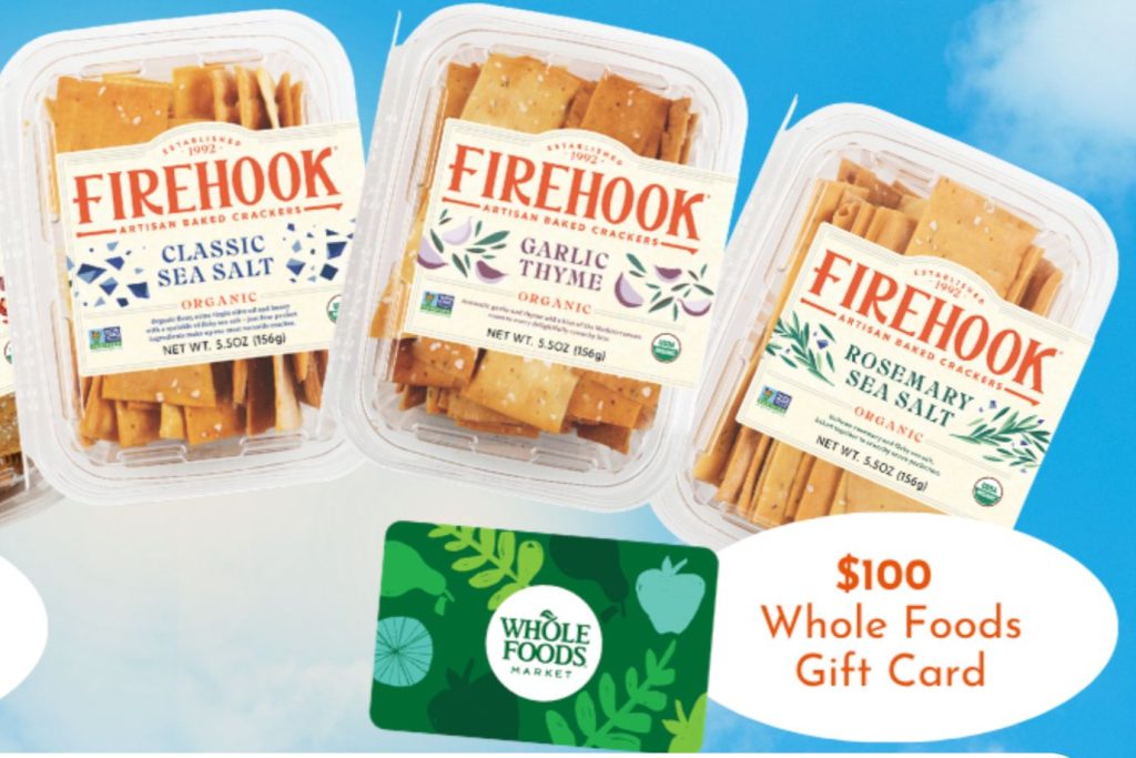 Three containers of FIREHOOK artisan baked crackers feature Classic Sea Salt, Garlic Thyme, and Rosemary Sea Salt flavors, alongside a $100 Whole Foods gift card, featured in the Firehook Crackers Sweepstakes