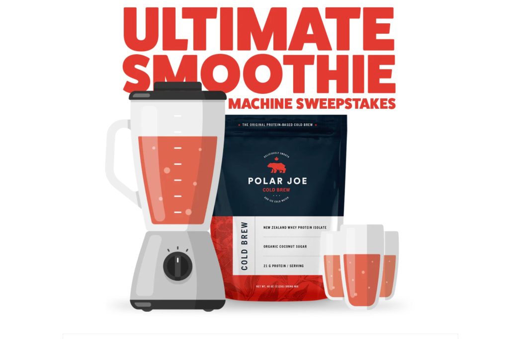 A blender filled with a pink smoothie sits next to a bag of Polar Joe cold brew, accompanied by three clear cups. Bold text above promotes a smoothie machine sweepstakes, featured in the Polar Joe Ultimate Smoothie Machine Sweepstakes