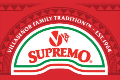 A vibrant, colorful design showcasing a red background with a white arch containing stylized lettering and decorative elements, suggesting a brand identity, featured in the V&V Supremo World Cup Tickets Sweepstakes