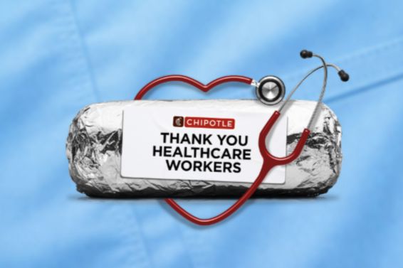 A burrito wrapped in foil is placed in front of a blue medical scrubs background, accompanied by a red heart shape and a stethoscope, expressing gratitude to healthcare workers, featured in the 2026 Chipotle Healthcare Professional and Teacher Sweepstakes