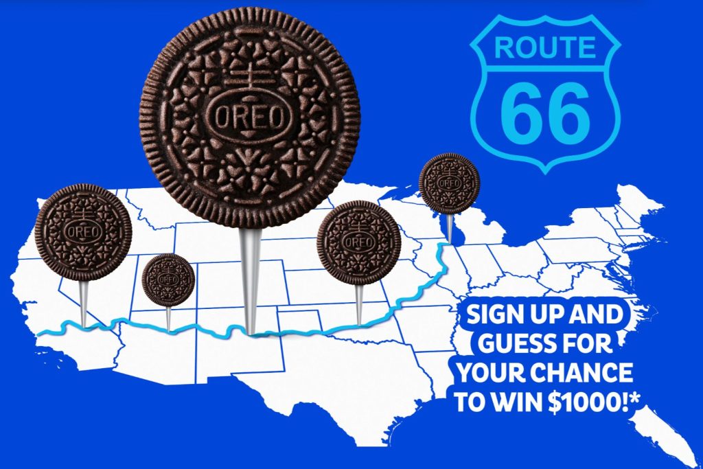 A vibrant blue background features a map of the United States with illustrations of Oreo cookies positioned along Route 66, inviting participation in a contest to win $1,000, featured in the OREO Route 66 Sweepstakes