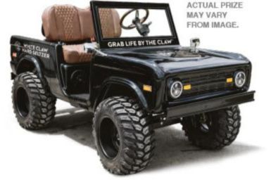 A black, vintage-style jeep with oversized tires and brown seating is showcased, featuring an open top and a steering wheel. The scene suggests outdoor adventure and fun, featured in the White Claw Ultimate Golf Cart Sweepstakes