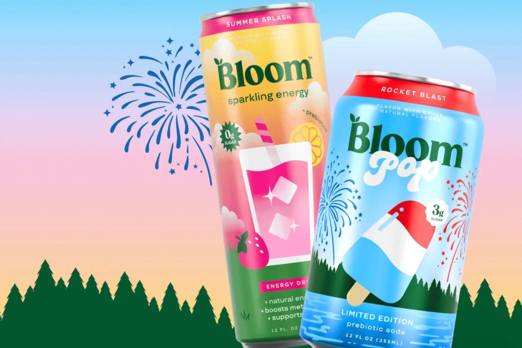 Two colorful cans of fruity energy drinks display a vibrant summer theme, set against a gradient sky with fireworks. Lively forest silhouettes complete the festive atmosphere, featured in the Bloom Summer 2026 Sweepstakes