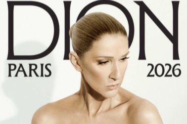 A woman with a sleek hairstyle poses gracefully, showcasing a confident expression against a light background, evoking elegance and sophistication, featured in the iHeartRadio Celine Dion Paris Sweepstakes