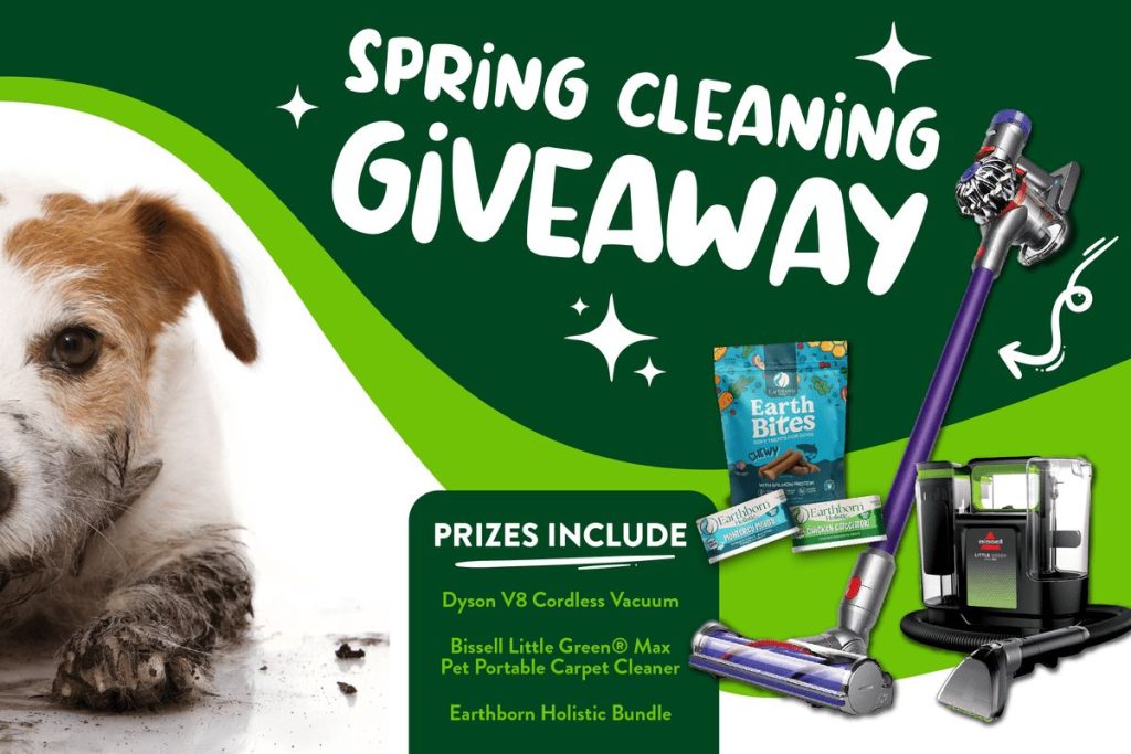 A small dog with muddy paws rests on the floor, next to a collection of cleaning products and pet treats, highlighting a spring cleaning giveaway theme, featured in the Earthborn Vacuum Sweepstakes