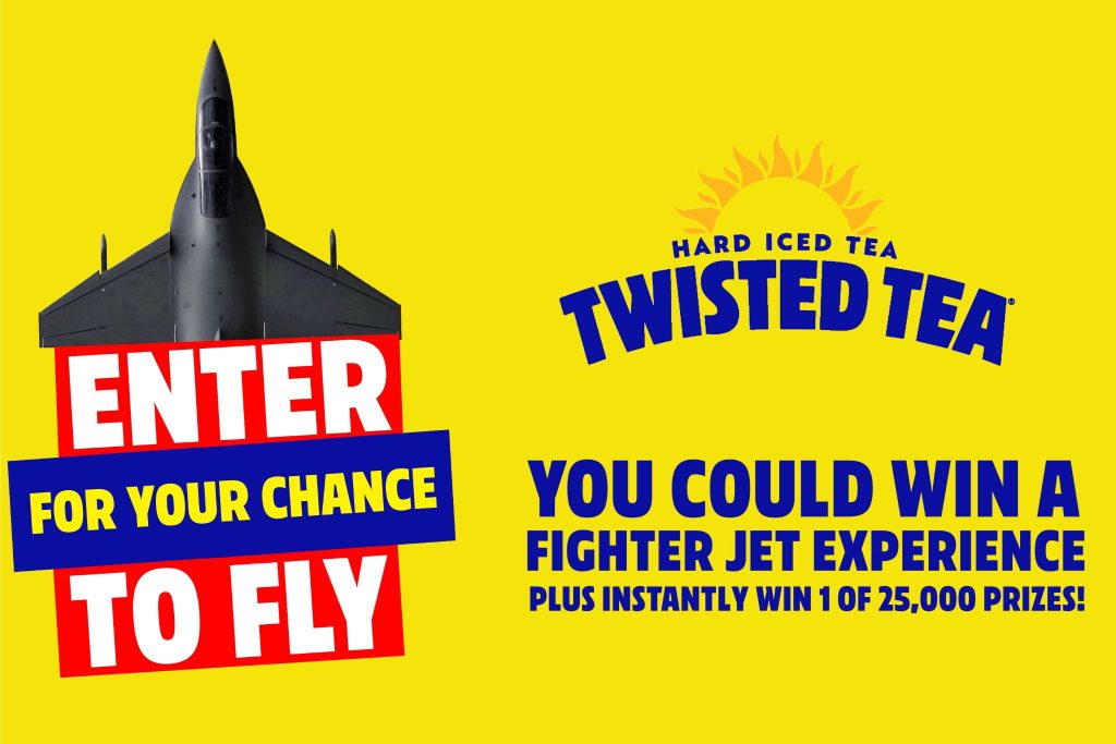 A sleek fighter jet is positioned against a bright yellow background, accompanied by bold text promoting a chance to win a fighter jet experience and other prizes, featured in the Twisted Tea Fighter Jet Sweepstakes