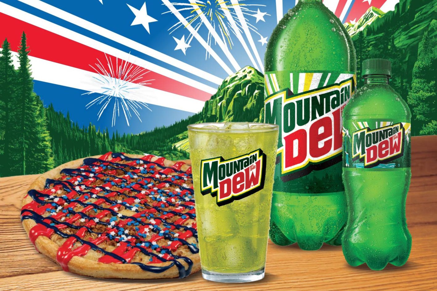 A festive scene featuring a decorated pizza adorned with red, white, and blue, alongside three Mountain Dew beverages and a backdrop of mountains and fireworks, featured in the Mountain Dew Happy Joe's 250th Sweepstakes