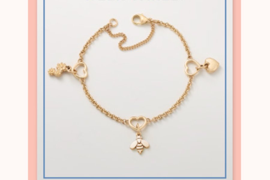 A delicate gold bracelet features charms in the shape of hearts and a bee, showcasing a playful and stylish design perfect for everyday wear, featured in the James Avery Summer Giveaway