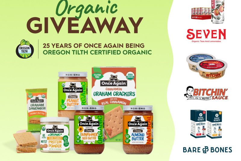 An array of organic food products is displayed, featuring jars of nut butters, graham crackers, and protein powder, celebrating 25 years of certification by Oregon Tilth, featured in the Once Again Organic Giveaway