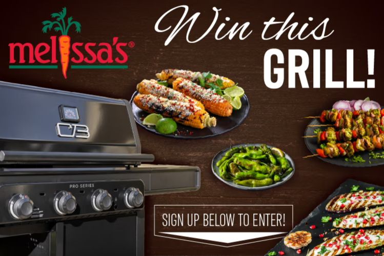 A sleek grill sits prominently alongside vibrant dishes, including skewers, corn, and grilled vegetables, enticing viewers to participate in a cooking contest, featured in the Melissa's Upgrade Your Grill Sweepstakes